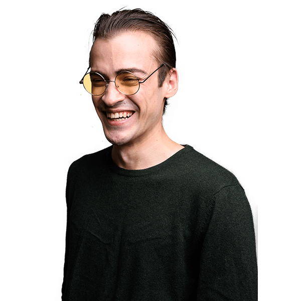 young-handsome-man-laughing-against-gray-studio-ba-NAFMGMSa.png
